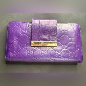 Authentic Gucci Guccissima leather flap continental wallet in purple